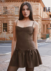Womens Running Late Mini Dress in the colour Chocolate in front of a light grey background