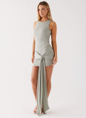 Womens Say Less Wrap Mini Dress in the colour Sage in front of a light grey background