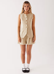Womens Siena Style Tailored Shorts in the colour Beige in front of a light grey background