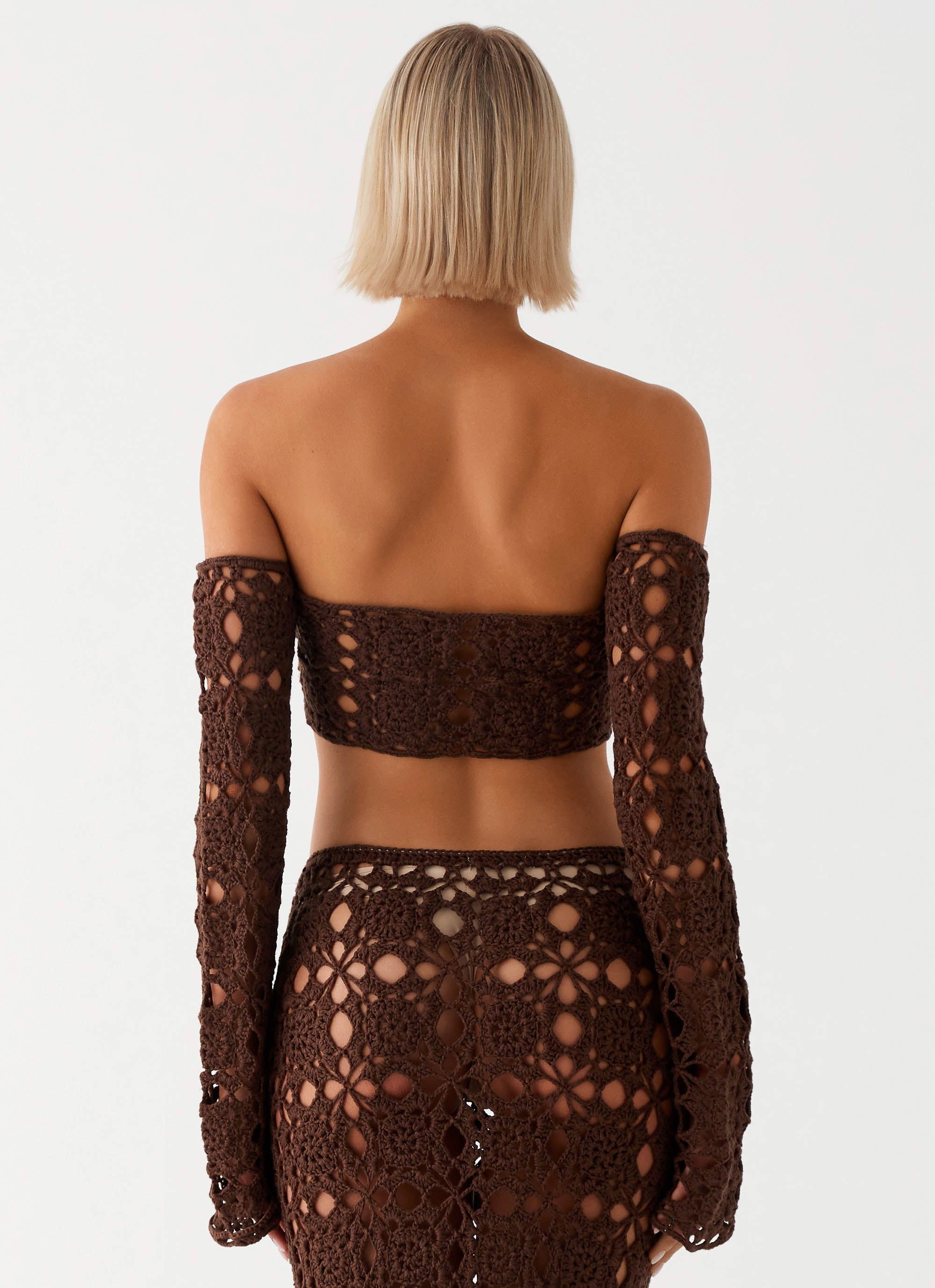 Womens Sorrentino Crochet Long Sleeve Top in the colour Chocolate in front of a light grey background
