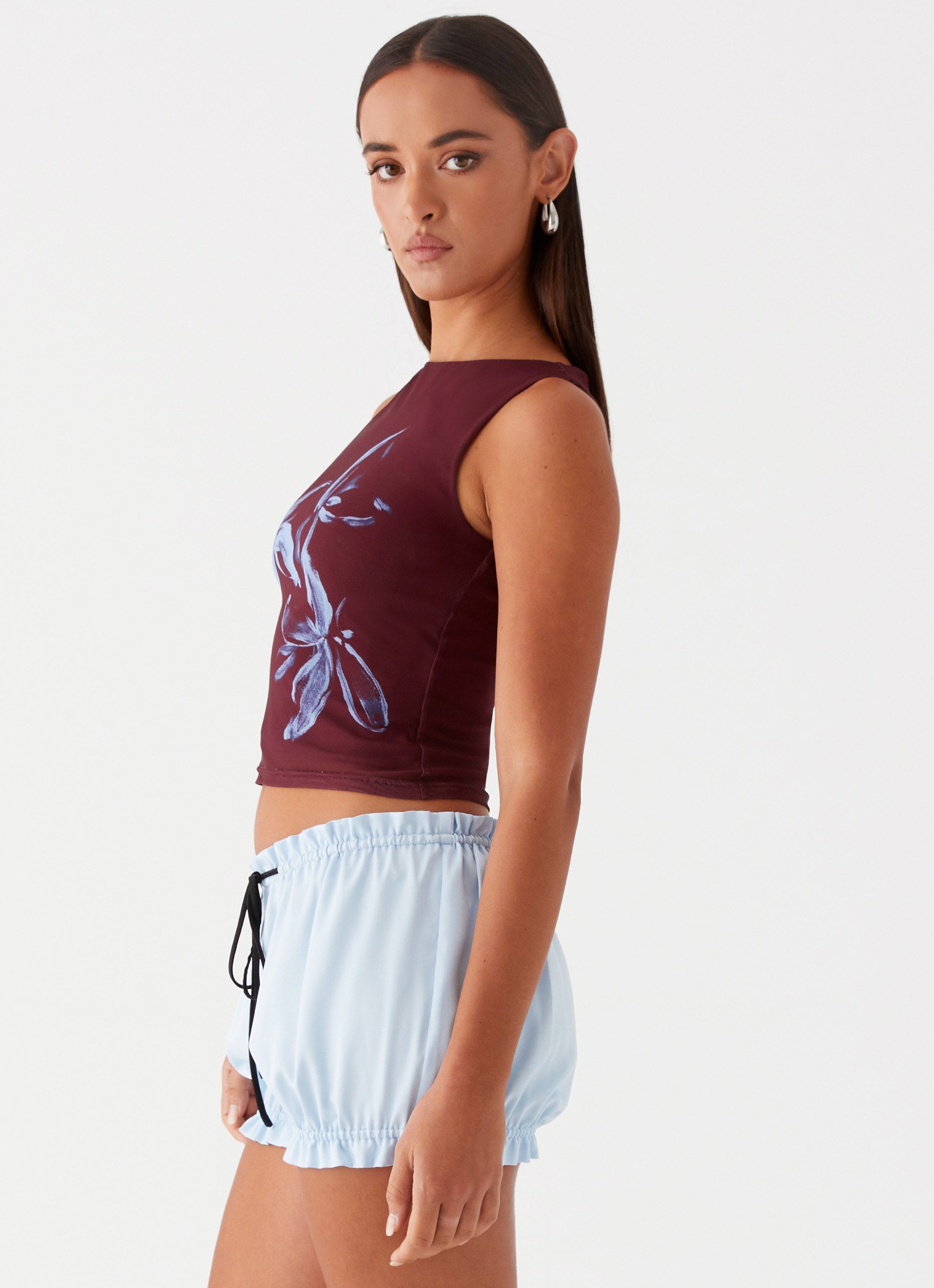 Womens Speak Now Mesh Top in the colour Brown in front of a light grey background