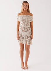 Womens Sunnyside Crochet Mini Dress in the colour Ivory in front of a light grey background