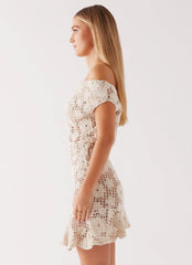 Womens Sunnyside Crochet Mini Dress in the colour Ivory in front of a light grey background