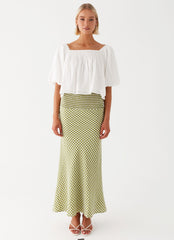 Womens Tanika Puff Sleeve Top in the colour White in front of a light grey background